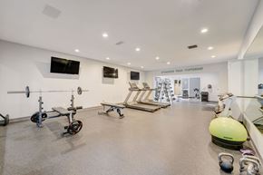 Cottage Grove apartment for rent - Modern fitness center with cardio and strength equipment at Hinton Heights Apartments in Cottage Grove, MN, serving residents of 1, 2, and 3 bedroom apartments for rent.
