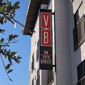Phoenix apartment for rent - Studios in Downtown Phoenix, AZ - VB on 12th Street - The Property Sign on the Side of the Property Building.