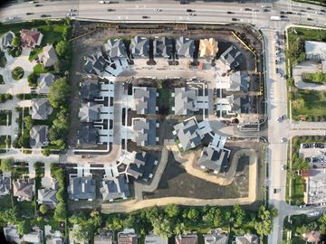 Glenview apartment for rent - A bird's eye view of a residential area with a large open space in the middle.