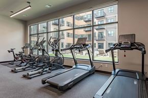 Kenosha apartment for rent - A gym with treadmills and exercise bikes.