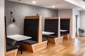 Edina apartment for rent - a dining room with two booths and tables