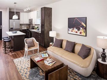 Minneapolis apartment for rent - a living room with a couch and a table