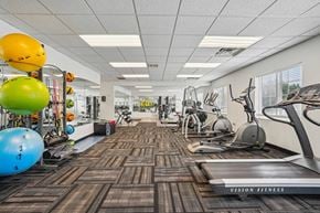 Burnsville townhouse for rent - Pet-Friendly Townhomes in Burnsville, MN – Summit Townhomes - a fitness center with treadmills and other exercise equipment
