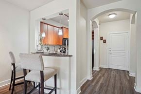 North Little Rock apartment for rent - Pet-Friendly Rentals in North Little Rock, AR – Metropolitan – A kitchen with a table and chairs.