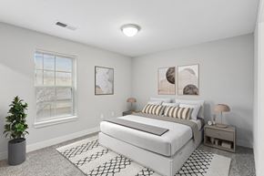 Sevierville apartment for rent - Apartments in Sevierville for Rent – Overlook at Allensville - A room with a window and a carpeted floor.