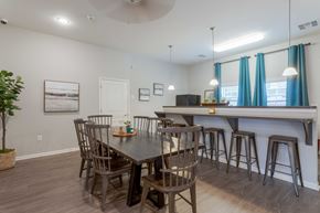 Sevierville apartment for rent - Pet-Friendly Rentals in Sevierville, TN – Overlook at Allensville – A dining room with a table and chairs in clubhouse