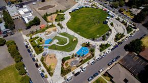 Portland apartment for rent - an overhead view of a park with a pool and grass