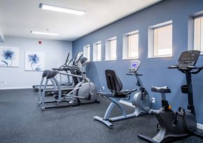 Springfield apartment for rent - a gym with various exercise equipment in a building