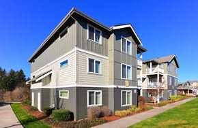 Olympia apartment for rent - an apartment building with a sidewalk in front of it