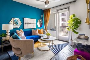 Las Vegas apartment for rent - a living room with a blue wall and a blue couch