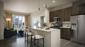 Dallas apartment for rent - A modern kitchen with a view of the city.