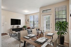 Maumelle apartment for rent - Apartments for Rent in Maumelle, AR 72113– Parc at Maumelle -   A modern dining room with a wooden table.