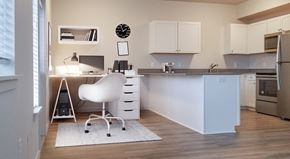 Vancouver apartment for rent - a home office with a desk and a chair in a kitchen