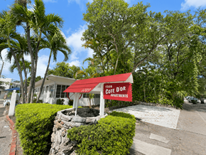 Ft. Lauderdale apartment for rent - A red sign with white lettering on a building reads "1209 Gotee Dr Apartments".