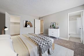 Colton apartment for rent - a bedroom with a large bed and a closet
