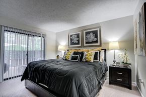 Raleigh apartment for rent - Bright bedroom in Raleigh, NC apartment at Remington Place with sliding glass doors and open layout
