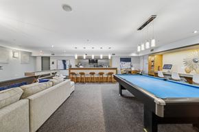 Des Plaines apartment for rent - Resident lounge with billiards table and comfortable seating at River 595