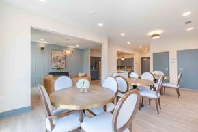 Norcross apartment for rent - Community dining room with elegant seating for resident gatherings and social events at Sage 5430 in Norcross, GA.