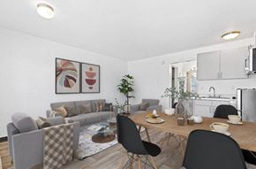 Las Vegas apartment for rent - a living room and dining room with a table and chairs