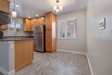 Milpitas apartment for rent - a kitchen with a stainless steel refrigerator and a counter top