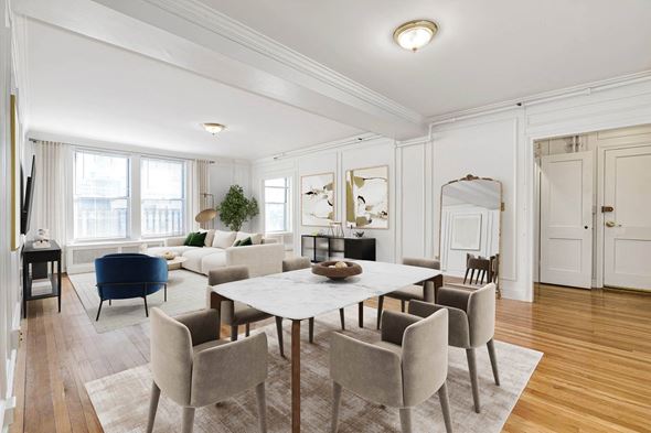 Brookline apartment for rent - Bright, open-concept living and dining area with marble table and hardwood floors.