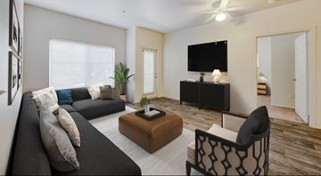 Flagstaff apartment for rent - A living room with a black couch, a brown coffee table, and a television on a black stand.