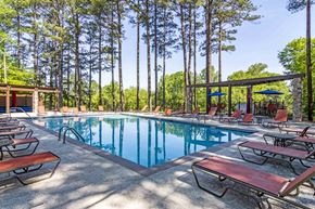 Marietta apartment for rent - Pool with lounge chairs at Stratford Ridge, a pet-friendly community in Marietta, GA, near Smyrna.