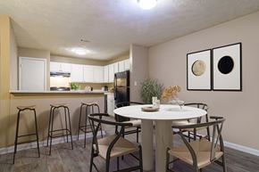 Marietta apartment for rent - Spacious Dining room adjacent to the kitchen at Stratford Ridge, a pet-friendly community in Marietta, GA, near Smyrna