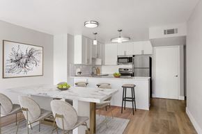 Alameda apartment for rent - A modern kitchen with a dining table and chairs.