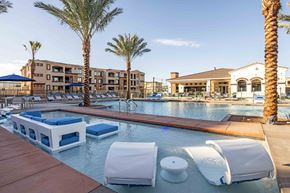 Chandler apartment for rent - Apartments for Rent in Chandler AZ - The Core Chandler - Resort-Style Pool with Lounge Chairs, Patio Furniture, Umbrellas, Wading Pool, and Palm Trees