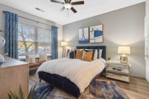 Mount Pleasant apartment for rent - Sage at 1240 apartments in Mount Pleasant South Carolina photo of bedroom with hardwood flooring and ceiling fan