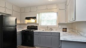 Atlanta apartment for rent - Modern kitchen with black appliances at Estuary apartments in Atlanta, GA 30341, near Chamblee and Brookhaven