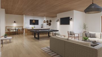 Euless apartment for rent - A modern living room with a pool table and a sofa.