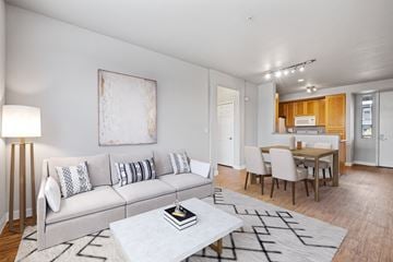 Petaluma apartment for rent - a living room with a couch and a table