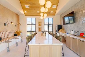 New Braunfels apartment for rent - A modern kitchen with a long island and a bench.