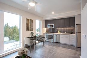 Portland apartment for rent - a kitchen and dining room with a large window