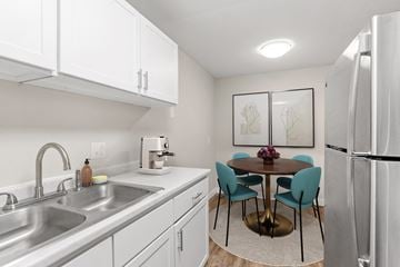 Eagan apartment for rent - A kitchen with a table and chairs.