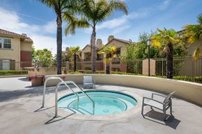 Ventura apartment for rent - a hot tub in a patio with palm trees