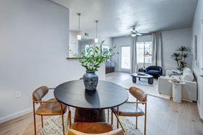 Henderson apartment for rent - A dining room with a round table and chairs.