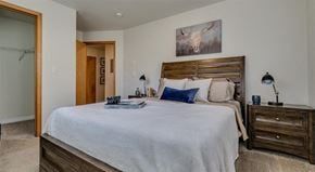 Spokane apartment for rent - Apartments for Rent Spokane - Canyon Bluffs - Bedroom with Plush Carpet, a Bed, Nightstands, and a Spacious Closet