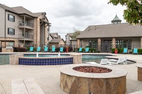 Rosenberg apartment for rent - swimming pool surrounded by beach chairs and fire pit