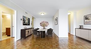 Washington apartment for rent - A dining room with a table set for four.