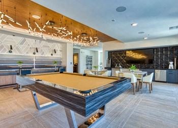 Entertain in the clubroom enjoying tvs, a kitchenette, coffee bar, billiards and banco seating