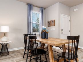 Myrtle Beach triplex for rent - a dining room with a table and chairs