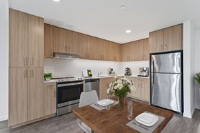 Portland apartment for rent - a kitchen and dining area in a 555 waverly unit