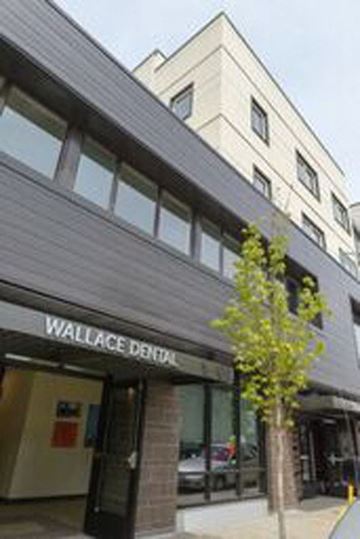 Portland apartment for rent - a building with a wallace bank on the street