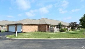 Delaware apartment for rent - the front of a brick house with a lawn