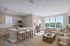 Fairfield apartment for rent - Bright open-concept kitchen and living area at Creekline at Fairfield apartments in Fairfield, CT, featuring light wood cabinetry