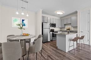 Hickory apartment for rent - Modern kitchen at Hawks Landing Apartments in Hickory, NC with stainless steel appliances and dining area