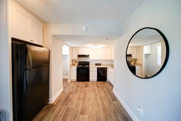 Charlotte apartment for rent - a kitchen with a stainless steel refrigerator and